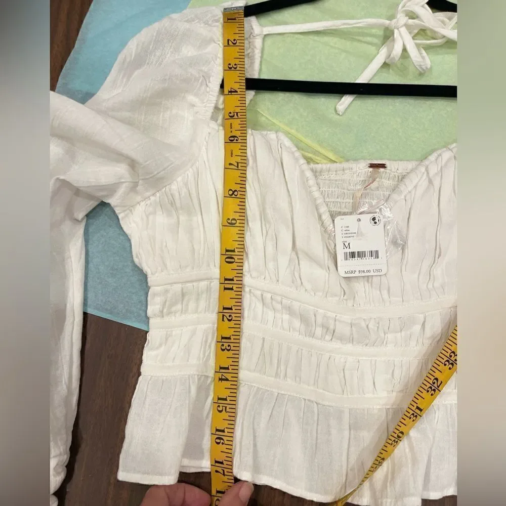 Free People Chloe puff sleeve blouse in white.Size M